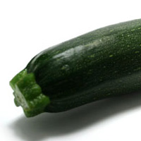 Photographie d'une courgette verte noire maraîchère